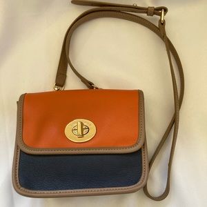 Spartina 449 Boutique Leather Mini Crossbody - Navy and Orange with Taupe Trim.